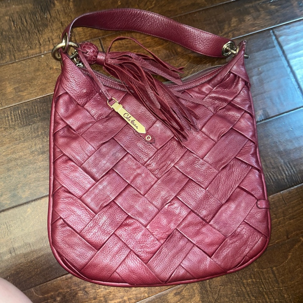 Deep red woven leather Cole Haan hobo nag with beautiful tasseled zipper